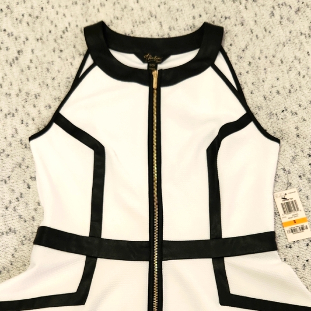 White and Black Zip-Up Peplum Top